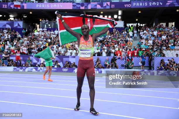 Emmanuel Wanyonyi of Team Kenya celebrates winning the Gold medal in the Men's 800m Final on day fifteen of the Olympic Games Paris 2024 at Stade de...