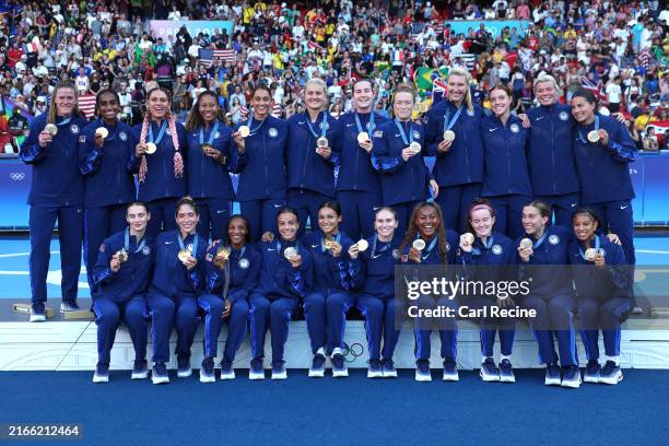 Gold Medalists of Team United States pose for a photo after the Women's Football Medal Ceremony during the Olympic Games Paris 2024 at Parc des...
