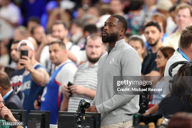 Former NBA player, and Olympic men's basketball commentator, Dwyane Wade looks on prior to the Men's Gold Medal game between Team France and Team...