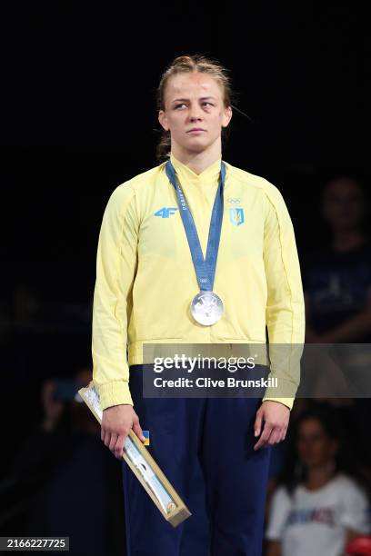Silver medalist Iryna Koliadenko of Team Ukraine looks on from the podium during the Taekwondo medal ceremony after the Women's Freestyle 62kg on day...
