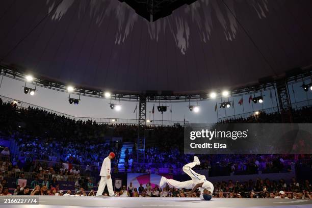 Boy Dany Dann of Team France competes with B-Boy Phil Wizard of Team Canada in the Breaking B-Boys Gold Medal Battle on day fifteen of the Olympic...