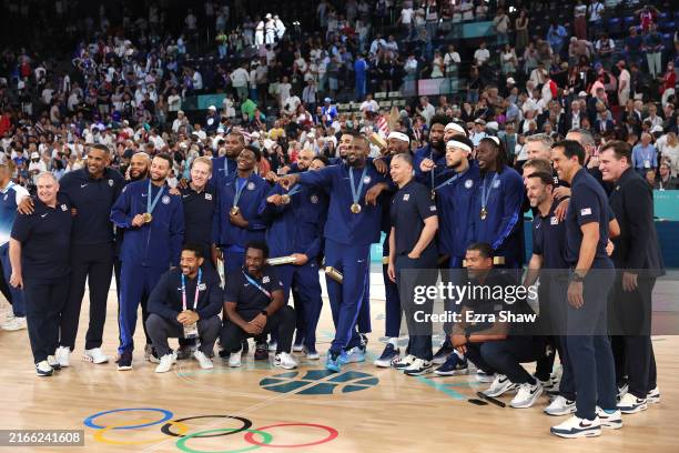 Gold medalists Team United States pose for a photo during the Men's basketball medal ceremony on day fifteen of the Olympic Games Paris 2024 at Bercy...