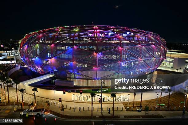 The new Intuit Dome is illuminated on opening night in Inglewood, California, August 15, 2024. The Intuit Dome is an indoor arena, home of the Los...