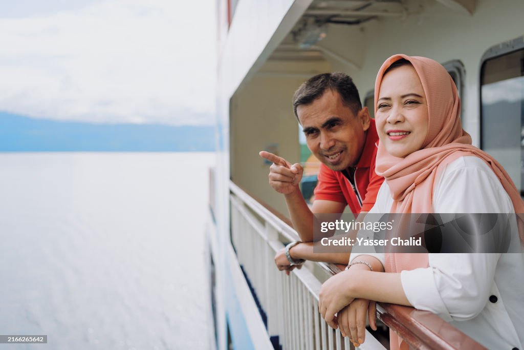 Asian couple on a cruise ship