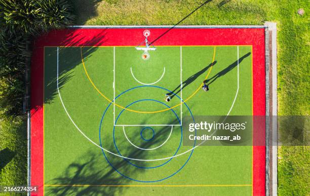 time to play some basketball. - courtyard stock pictures, royalty-free photos & images