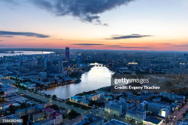 Evening panorama of the modern city of Yekaterinburg on the banks of the Iset river