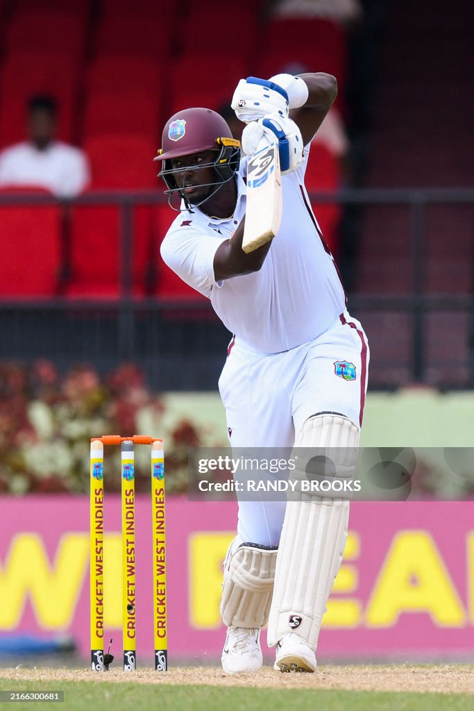 Jason Holder of West Indies hits 4 during Day 2 of the 2nd Test match ...