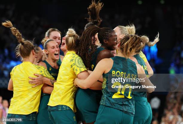 Team Australia celebrate victory during the Women's Bronze Medal game between Team Belgium and Team Australia on day sixteen of the Olympic Games...
