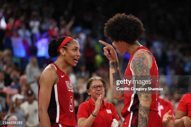Ja Wilson of Team United States and Brittney Griner of Team United States celebrate after their victory against Team France during the Women's Gold...