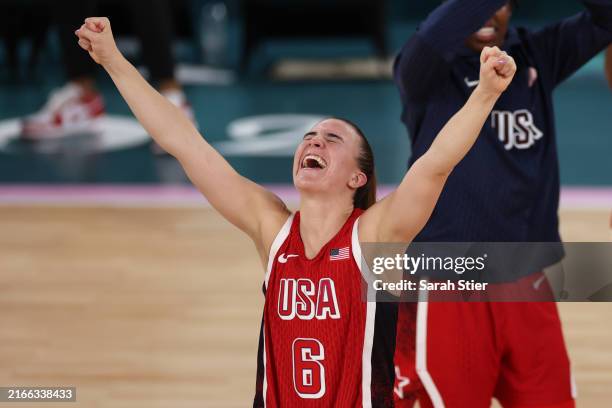 Sabrina Ionescu of Team United States celebrates after her team's victory against Team France during the Women's Gold Medal game between Team France...