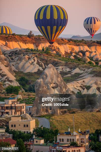 hot air balloons at love valley in cappadocia - cappadocia stock pictures, royalty-free photos & images