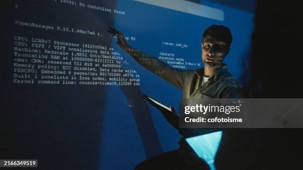 artificial intelligence developer team meeting at night - data science stock pictures, royalty-free photos & images