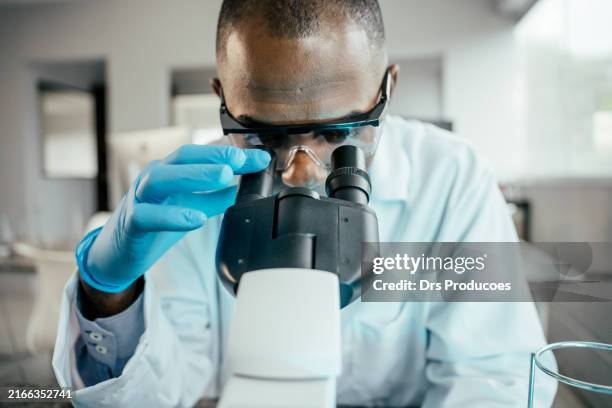 Microscope Man 1,164 Black Man Microscope Stock Photos, High-Res Pictures, and Images ...