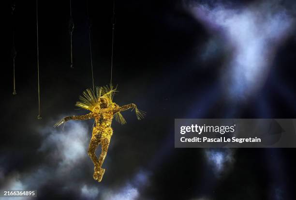 The Golden Voyager descends into the Stadium as a light show takes place during the Closing Ceremony of the Olympic Games Paris 2024 at Stade de...