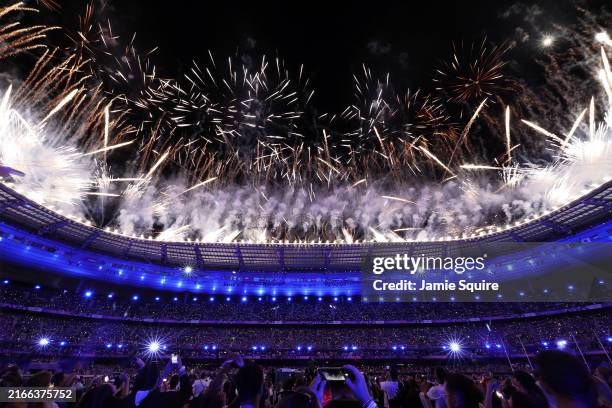 General view of the inside of the stadium as French Singer-Songwriter Yseult performs “My Way” as a Pyrotechnics Display takes place during the...