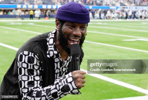 Tyrese Gibson sings the national anthem during a preseason game between the Dallas Cowboys and the Los Angeles Rams at SoFi Stadium on August 11,...