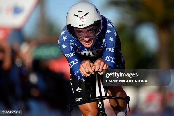 Team UAE's Brandon McNulty competes in the stage 1 of La Vuelta a Espana cycling tour, a 12 km time-trial race from Lisbon to Oeiras, on August 17,...