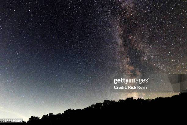 Meteor streaks across the sky during the Perseids meteor shower peak at Pedernales Falls State Park on August 12, 2024 in Johnson City, Texas.