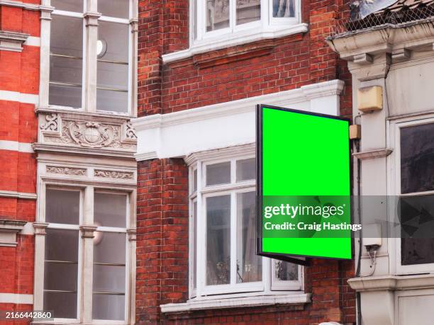 london green screen for real estate. apartment flat house european city centre property for sale or rent. sign advertising billboard green screen chromakey with copy space - estate agent sign stock pictures, royalty-free photos & images