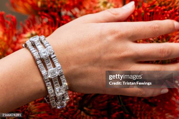 Van Cleef & Arpels articulated platinum bracelet set with diamonds USD 2 000, goes on view as part of the “Hafla” exhibition at Sotheby's on August...