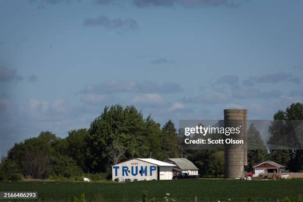 Farmer uses a barn to show support for Republican presidential candidate former President Donald Trump on August 10, 2024 near Charles City, Iowa....