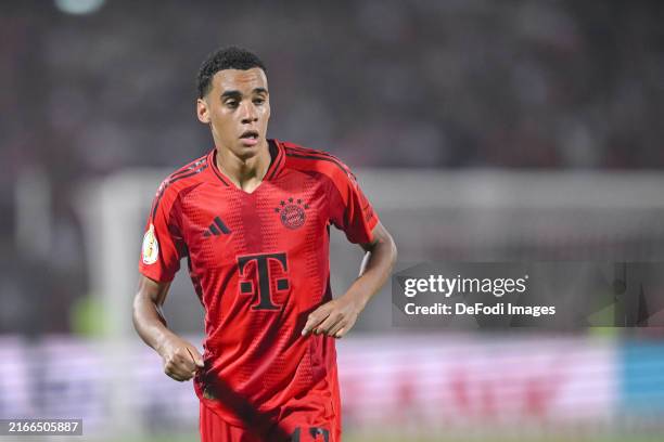Jamal Musiala of Bayern Muenchen looks on during the DFB-Pokal match between SSV Ulm 1846 and FC Bayern München on August 16, 2024 in Ulm, Germany.