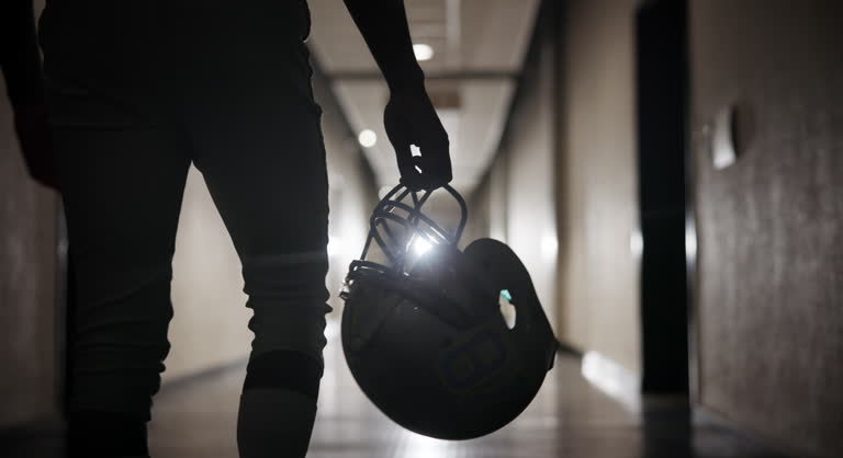 https://media.gettyimages.com/id/2166590710/video/football-player-helmet-and-walking-through-tunnel-in-stadium-for-tournament-match-day-and.jpg?b=1&s=640x640&k=20&c=E5N2qkzXF2sGXrhh7WbkbsAIhtVYl1SqVvEONwp37Sg=