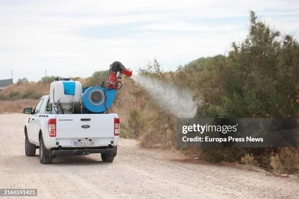 Pick up fogger speaks in the campaign for the treatment of mosquitoes that spread West Nile Virus . On August 13 in Coria del Rio, Seville . The...