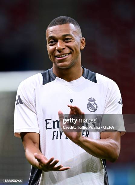 Kylian Mbappe of Real Madrid CF reacts during a training session at National Stadium on August 13, 2024 in Warsaw, Poland.