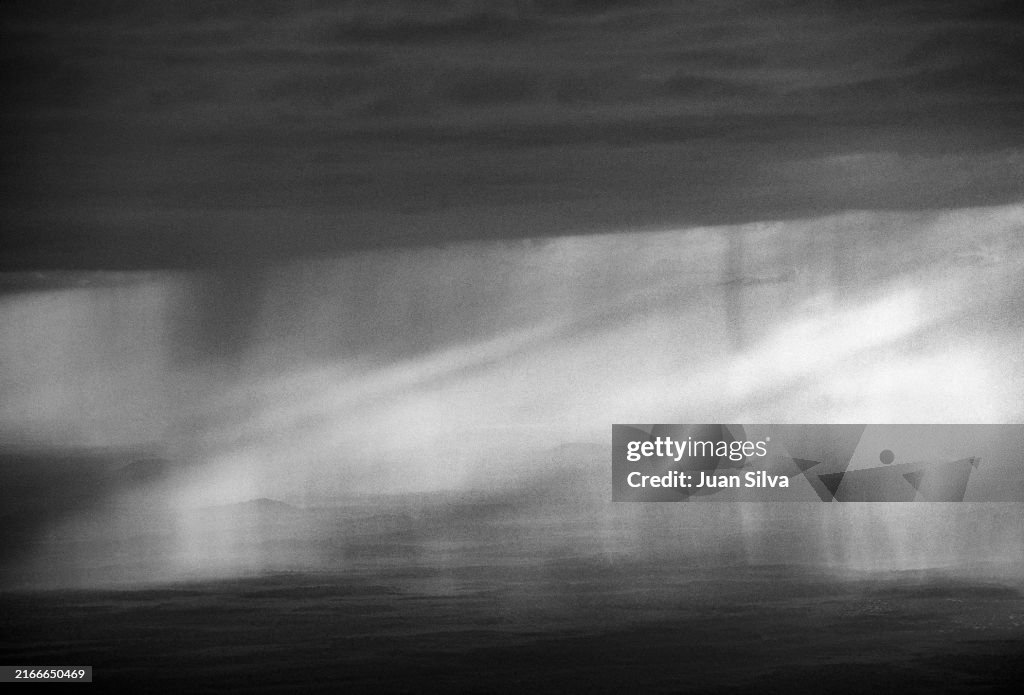 Aerial view from Cerro Autana of rain storm falling on the Amazonas State rain forest, Venezuela