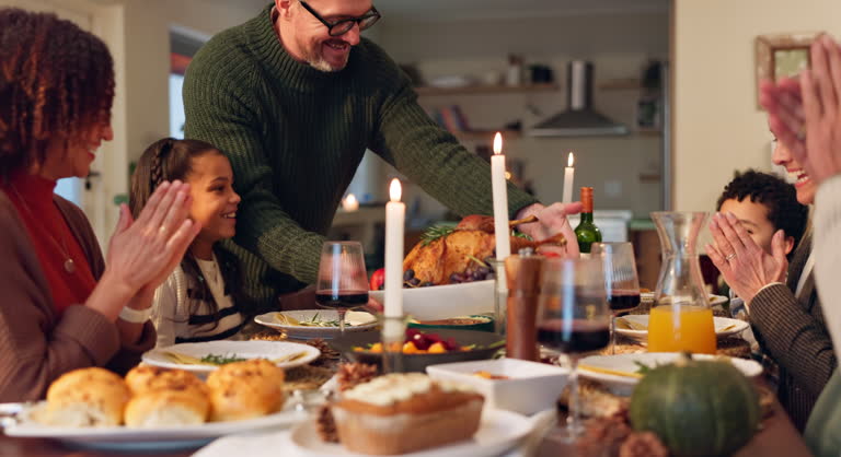 https://media.gettyimages.com/id/2166657175/video/man-serving-and-turkey-with-celebration-for-thanksgiving-with-happy-family-feast-and-food-for.jpg?b=1&s=640x640&k=20&c=KO_f2BR722RVvw6X5mY1Fg-ofu9yBFh_mV0V9TAElPc=