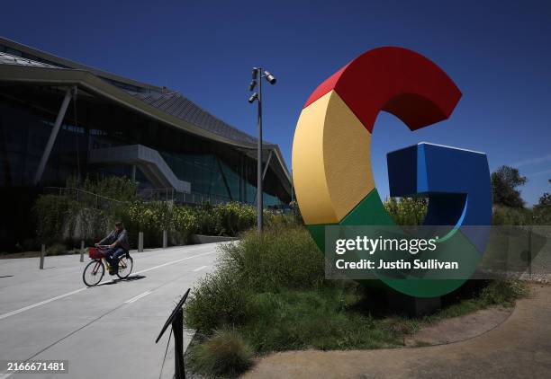 The Google logo is displayed in front of company headquarters during the Made By Google event on August 13, 2024 in Mountain View, California. Google...