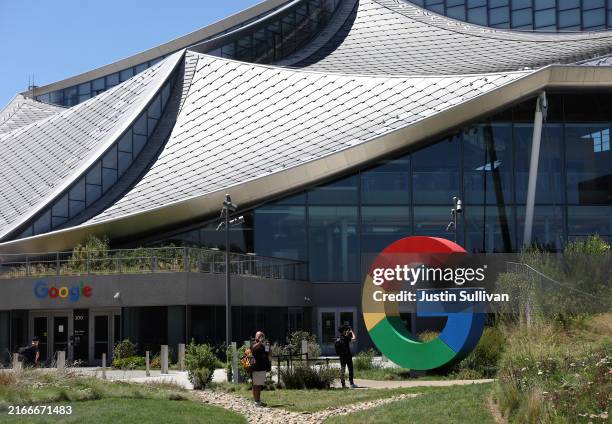 The Google logo is displayed in front of company headquarters during the Made By Google event on August 13, 2024 in Mountain View, California. Google...