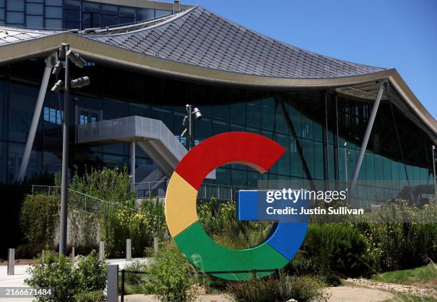 The Google logo is displayed in front of company headquarters during the Made By Google event on August 13, 2024 in Mountain View, California. Google...