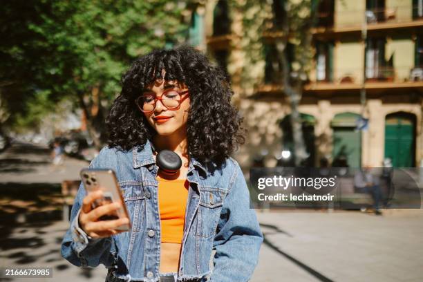 fashionable young woman in barcelona - young women stock pictures, royalty-free photos & images