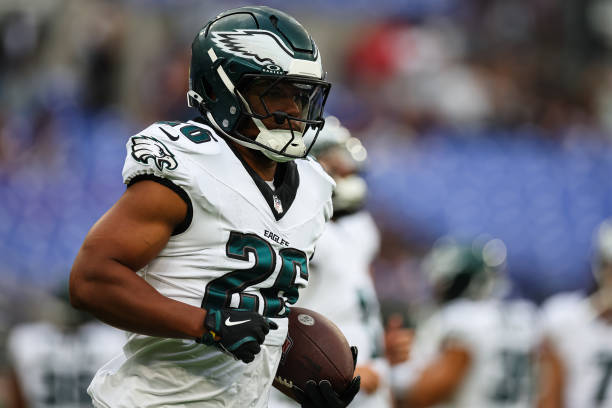 Saquon Barkley of the Philadelphia Eagles warms up before a preseason game against the Baltimore Ravens at M&T Bank Stadium on August 9, 2024 in...