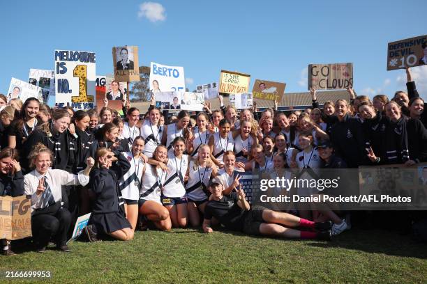 Melbourne Girls Grammar celebrate with the shield after winning the Herald Sun Shield Senior Girls Div 1 Grand Final match between Melbourne Girls...