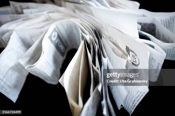 In this photo illustration a pile of receipts lies on a table on August 09, 2024 in Berlin, Germany.