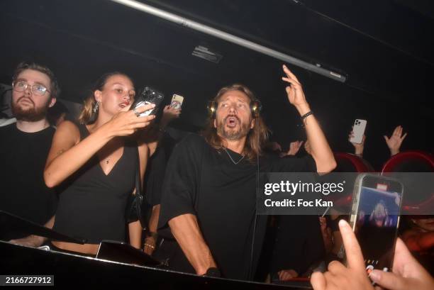 Paloma Le Friant and her father Bob Sinclar assisted by DJ Bastos attend the Bob Sinclar Party At VIP Room Saint Tropez on August 13, 2024 in...