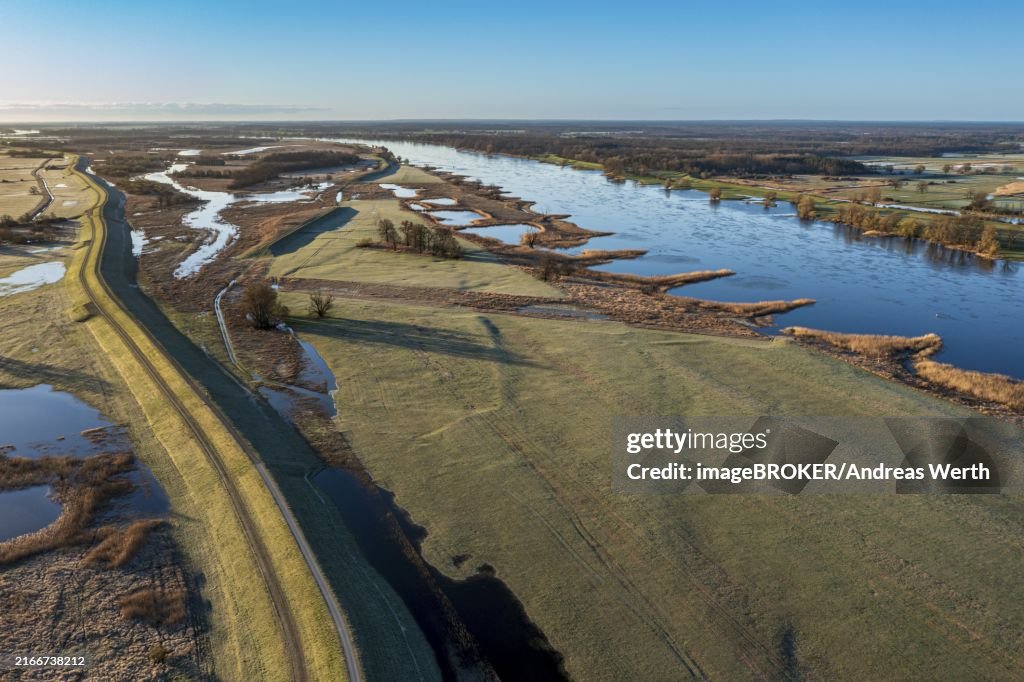 Aerial view of new dyke construction further inlands than the old dyke, flood protection, river Elbe near village Lenzen, dyke is part of Elbe cycle route, Germany, Europe