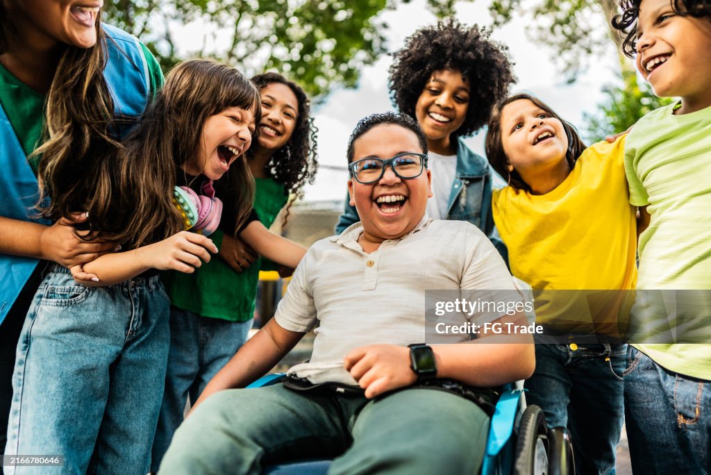 Happy students on schoolyard