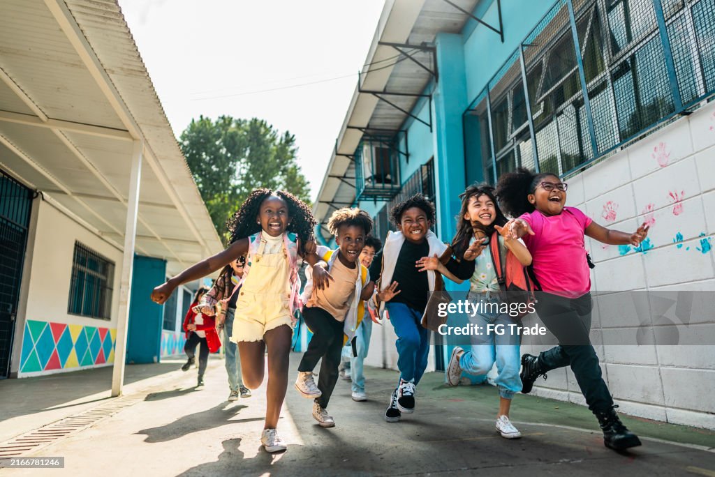 Student Runing Students Running On Schoolyard High-Res Stock Photo - Getty Images