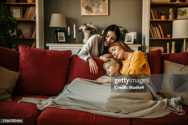 afternoon nap - family cover stock pictures, royalty-free photos & images