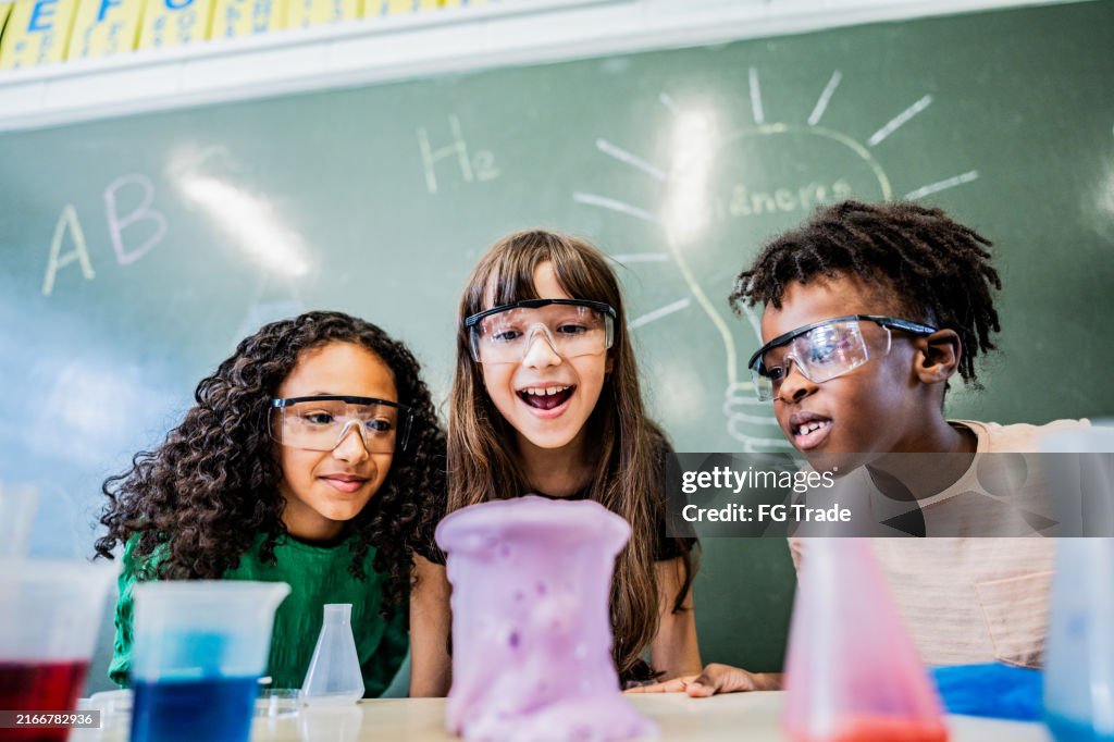 Students doing an experiment on classroom on school