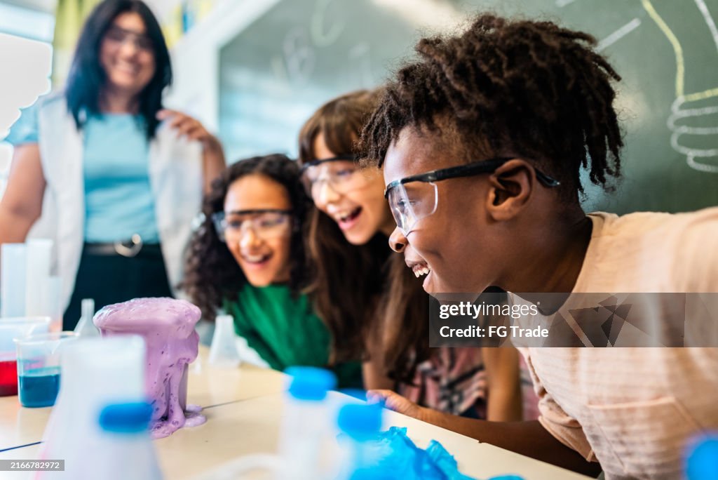 Students doing an experiment on classroom on school