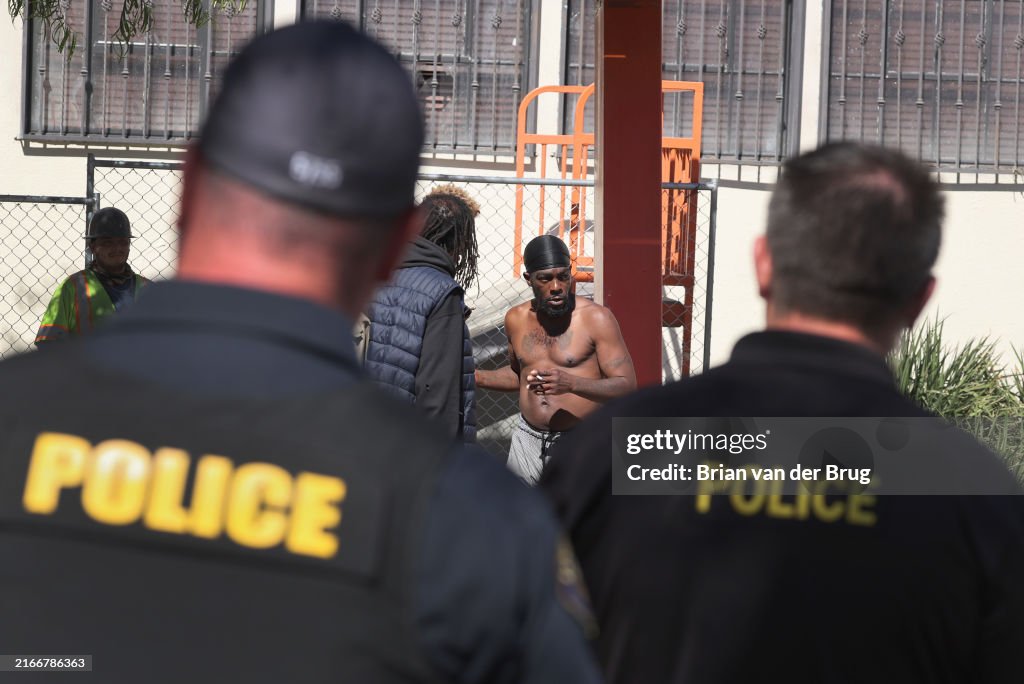 Problomatic Monday As police look on, a homeless man identifying himself as Stanley ...