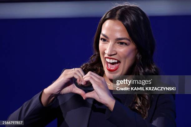 Representative Alexandria Ocasio-Cortez gestures after speaking on the first day of the Democratic National Convention at the United Center in...