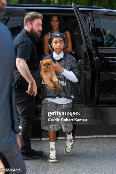 North West and Kim Kardashian are seen in Manhattan on August 14, 2024 in New York City.