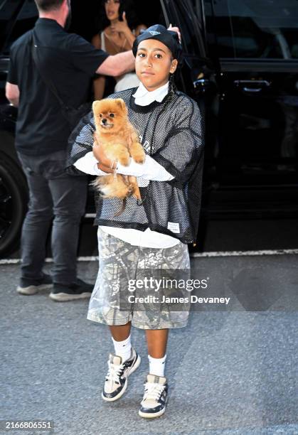 Kim Kardashian and North West are seen in Midtown Manhattan on August 14, 2024 in New York City.