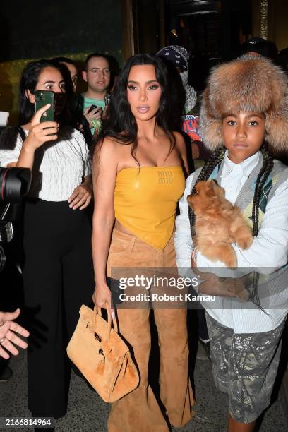 Kim Kardashian and daughter North West are seen out for dinner at the Polo Bar on August 14, 2024 in New York City.